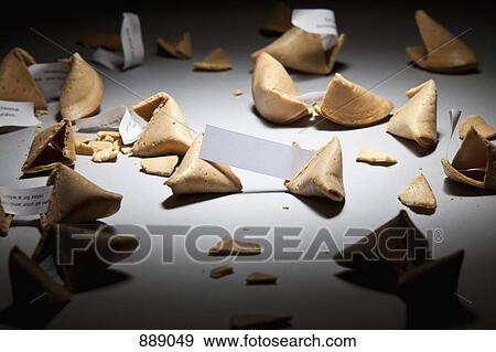 Stock Photo - Open fortunes cookies with messages. Fotosearch