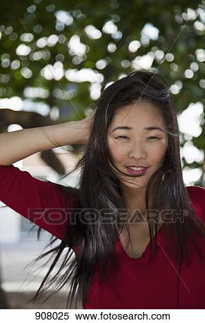 Portrait of a young woman View Large Photo Image Stock Photography - Portrait of a young woman. Fotosearch