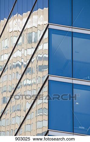 Reflection In The Glass Facade Of A Building View Large Photo Image Stock Photography - Reflection In The Glass Facade Of A Building. Fotosearch