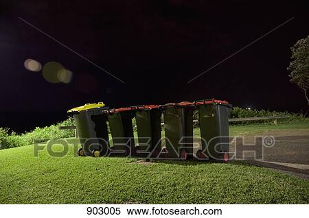 Stock Photography - Rubbish bins in a row. Fotosearch