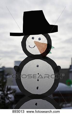Stock Image - Snowman window decoration. Fotosearch