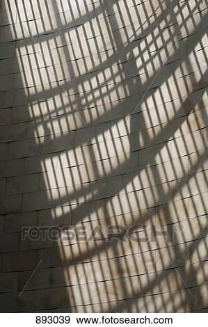 Sunlight and shadow of bars on a stone wall View Large Photo Image Stock Photo - Sunlight and shadow of bars on a stone wall. Fotosearch