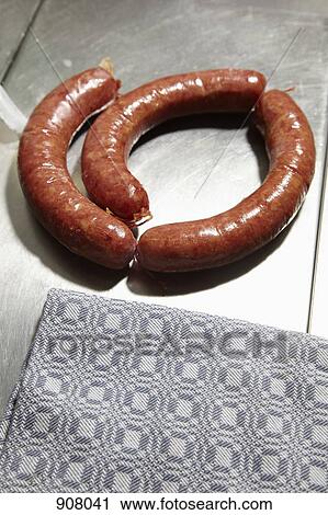 Three smoked sausages View Large Photo Image Stock Image - Three smoked sausages. Fotosearch