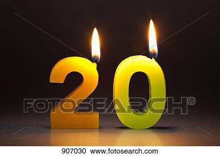 Stock Image - Two Candles In The Shape Of The Number 20. Fotosearch