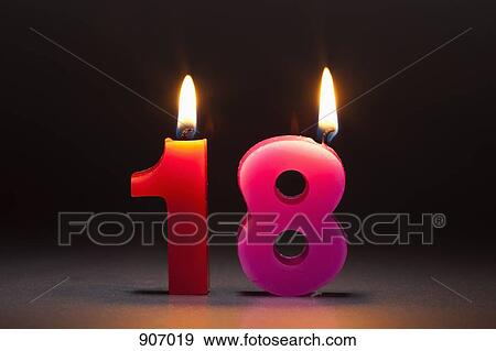 Stock Photo - Two Candles In The Shape Of The Number 18. Fotosearch