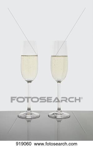 Stock Image - Two glasses of champagne. Fotosearch
