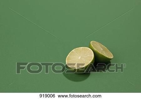 Two halves of a lime View Large Photo Image Stock Photograph - Two halves of a lime. Fotosearch