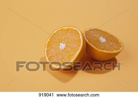 Two halves of an orange View Large Photo Image Stock Image - Two halves of an orange. Fotosearch