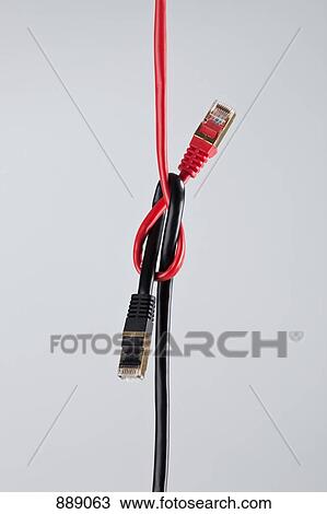 Two network cables tied in a knot View Large Photo Image Stock Image - Two network cables tied in a knot. Fotosearch