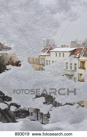 Stock Photo - View out of a snow covered window, Berlin, Germany. Fotosearch