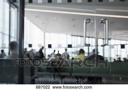 View through glass doors of an airport lounge View Large Photo Image Stock Image - View through glass doors of an airport lounge. Fotosearch