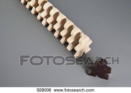 A brown wooden stick figure leading a line of unpainted wooden stick figures View Large Photo Image Stock Photograph - A brown wooden stick figure leading a line of unpainted wooden stick figures. Fotosearch