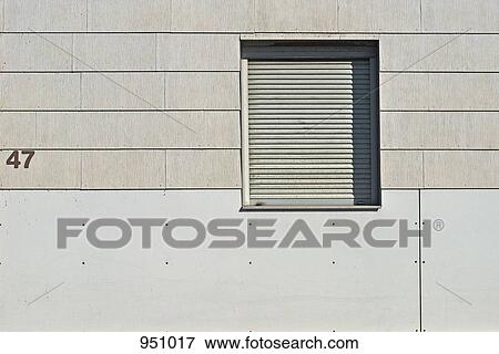 A closed rolling window shutter View Large Photo Image Stock Photo - A closed rolling window shutter. Fotosearch