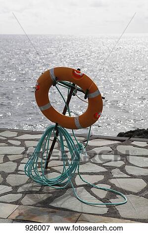 A life preserver on a pier View Large Photo Image Stock Photo - A life preserver on a pier. Fotosearch