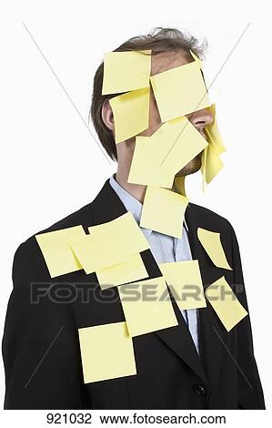 Stock Image - A man covered in blank adhesive notes. Fotosearch