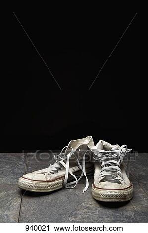 Stock Image - A pair on canvas shoes. Fotosearch