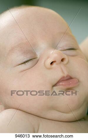 A sleeping baby, close-up View Large Photo Image Stock Image - A sleeping baby, close-up. Fotosearch