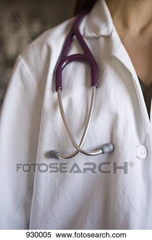 Stock Photography - A stethoscope around a doctor's neck. Fotosearch