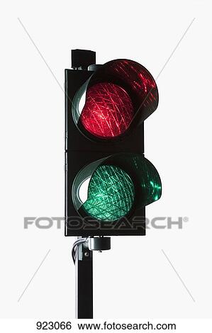 A stoplight with both the red light and green light illuminated View Large Photo Image Stock Photograph - A stoplight with both the red light and green light illuminated. Fotosearch