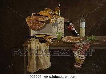 A table with a microwave and various frozen pizzas and frozen lasagna, still life View Large Photo Image Stock Photograph - A table with a microwave and various frozen pizzas and frozen lasagna, still life. Fotosearch