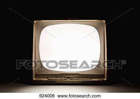 Stock Photograph - A television with an illuminated, blank screen. Fotosearch