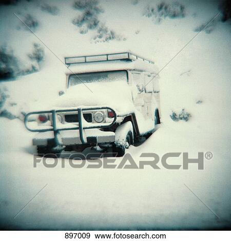 A vintage style photograph of a 4WD in snow View Large Photo Image Stock Photo - A vintage style photograph of a 4WD in snow. Fotosearch