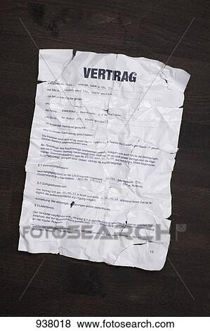 A wrinkled, torn, German sales contract taped together and flattened out View Large Photo Image Stock Photo - A wrinkled, torn, German sales contract taped together and flattened out. Fotosearch