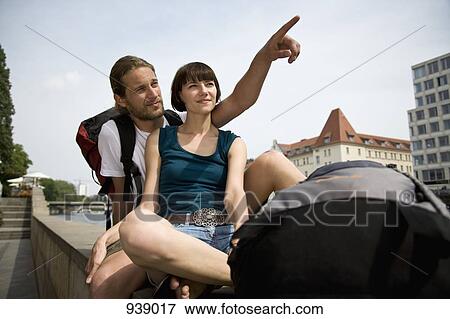 A young couple relaxing by the Spree river, Berlin, Germany View Large Photo Image Stock Photo - A young couple relaxing by the Spree river, Berlin, Germany. Fotosearch