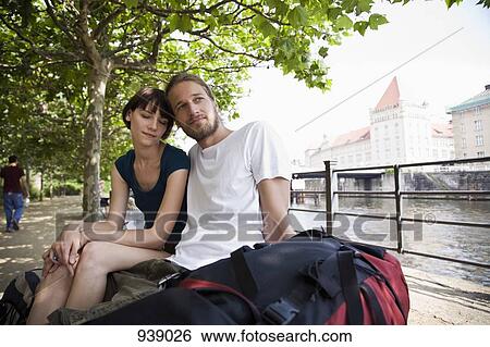 A young couple relaxing by the Spree river, Berlin, Germany View Large Photo Image Stock Photograph - A young couple relaxing by the Spree river, Berlin, Germany. Fotosearch