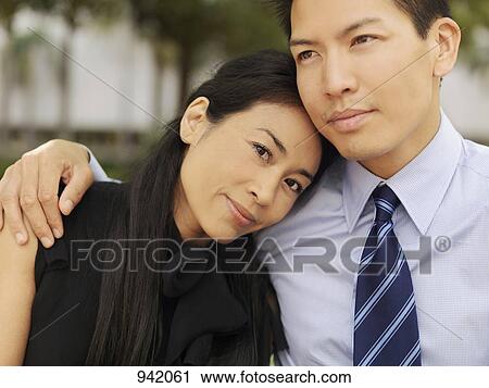 An affectionate businessman and businesswoman View Large Photo Image Stock Image - An affectionate businessman and businesswoman. Fotosearch