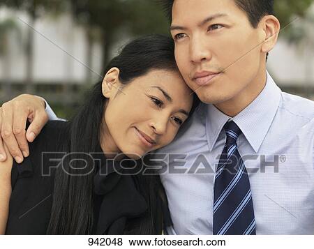 An affectionate businessman and businesswoman View Large Photo Image Stock Photo - An affectionate businessman and businesswoman. Fotosearch