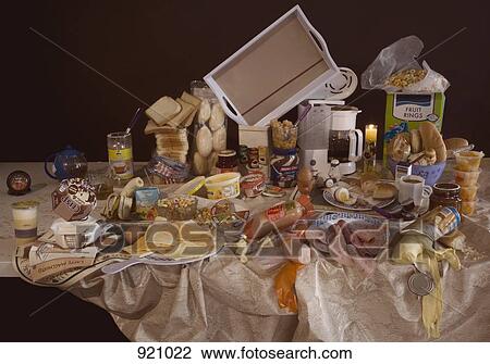 Stock Image - An excess of breakfast foods on a table, still life. Fotosearch