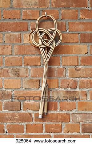 An old-fashioned carpet beater View Large Photo Image Picture - An old-fashioned carpet beater. Fotosearch