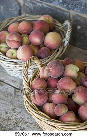 Baskets of peaches View Large Photo Image Stock Photo - Baskets of peaches. Fotosearch