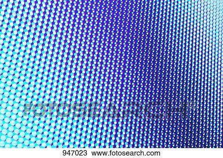 Stock Image - Blue dotted pattern, full frame. Fotosearch