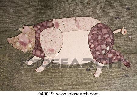 Cold cut meats arranged in the shape of a pig on wood View Large Photo Image Stock Photo - Cold cut meats arranged in the shape of a pig on wood. Fotosearch