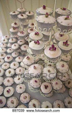 Cupcakes on a stand View Large Photo Image Stock Photo - Cupcakes on a stand. Fotosearch