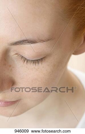 Detail of a redheaded woman's face View Large Photo Image Stock Photo - Detail of a redheaded woman's face. Fotosearch
