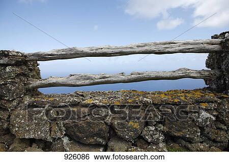 Stock Photograph - Detail of a stone wall. Fotosearch