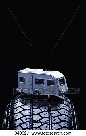 Detail of a toy trailer on a car tire View Large Photo Image Stock Photo - Detail of a toy trailer on a car tire. Fotosearch