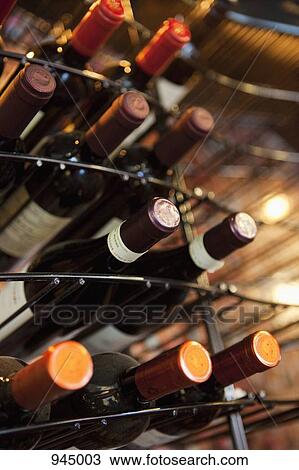 Detail of bottles of wine in a rack View Large Photo Image Stock Image - Detail of bottles of wine in a rack. Fotosearch