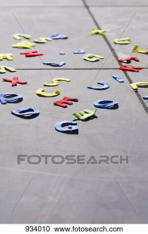 Detail of felt alphabet letters on the ground View Large Photo Image Stock Image - Detail of felt alphabet letters on the ground. Fotosearch