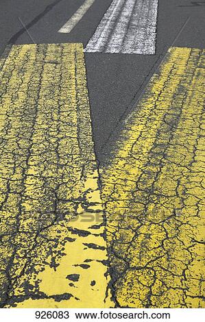 Stock Image - Detail of markings on asphalt. Fotosearch