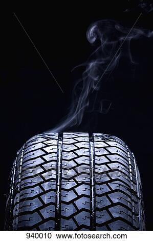 Detail of smoke coming from a car tire View Large Photo Image Stock Image - Detail of smoke coming from a car tire. Fotosearch