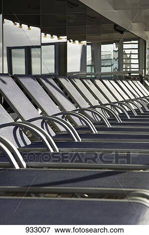 Detail of sun lounges on a cruise ship View Large Photo Image Stock Photo - Detail of sun lounges on a cruise ship. Fotosearch