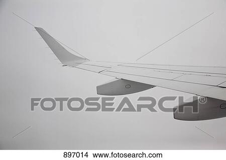 Detail of the wing of a plane View Large Photo Image Picture - Detail of the wing of a plane. Fotosearch