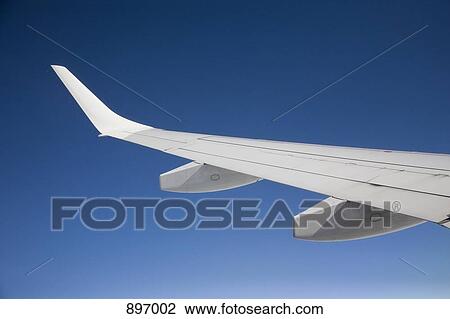 Detail of the wing of a plane View Large Photo Image Stock Image - Detail of the wing of a plane. Fotosearch
