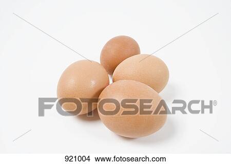 Picture - Four brown eggs. Fotosearch