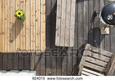 Stock Photography - Furniture and barbecue on a patio, directly above. Fotosearch