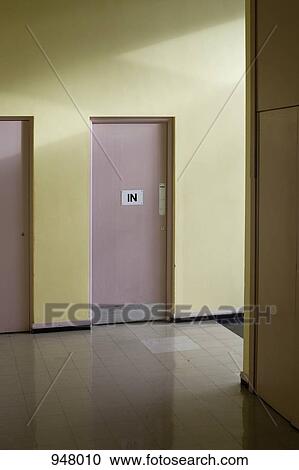 IN sign on a door in a hallway View Large Photo Image Stock Image - IN sign on a door in a hallway. Fotosearch